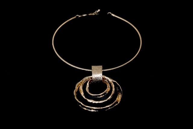 Gold Necklace with circular design